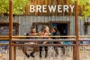 A trio cheers on the Animas Brewing Company patio in Durango.
