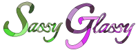 Words " Sassy Glassy" "Sassy is written in green with mosaic glass styling. "Glassy is written in pink and purple with mosaic glass styling