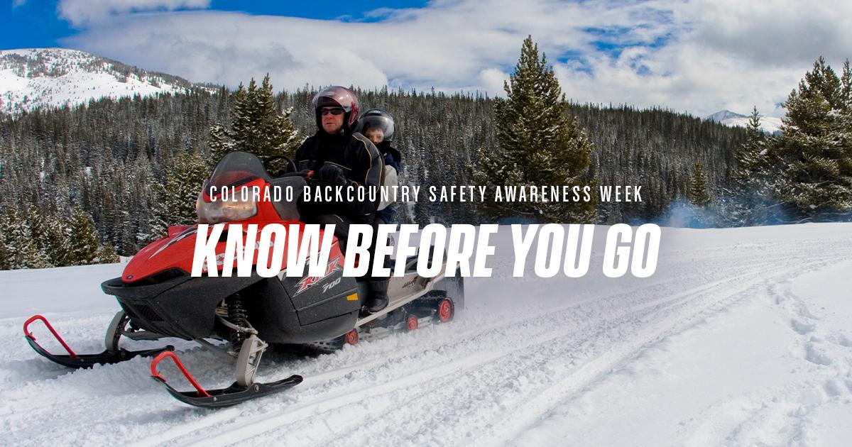 picture of people snowmobiling with text, "Know Before You Go."