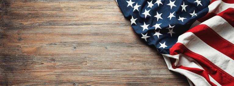 United States Flag On Wooden Background