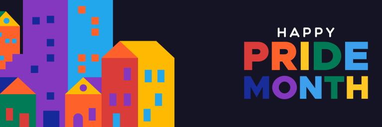 colorful rainbow buildings and pride month written