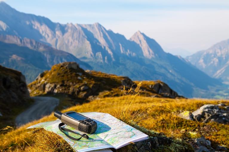 compass and map on mountaintop