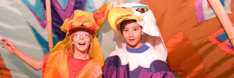 two kids dressed in costumes