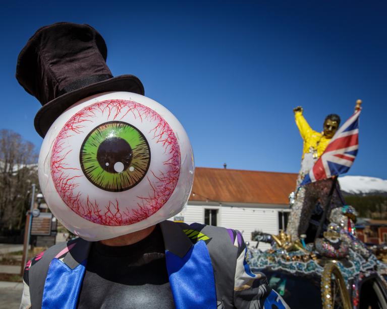 Man wearing a huge eye costume
