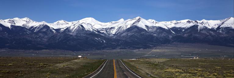 Road leading into the mountains Custer County