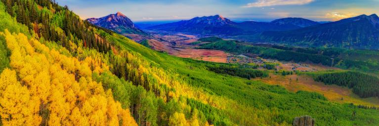 Overlooking Crested Butte during sunset with fall colors in peak