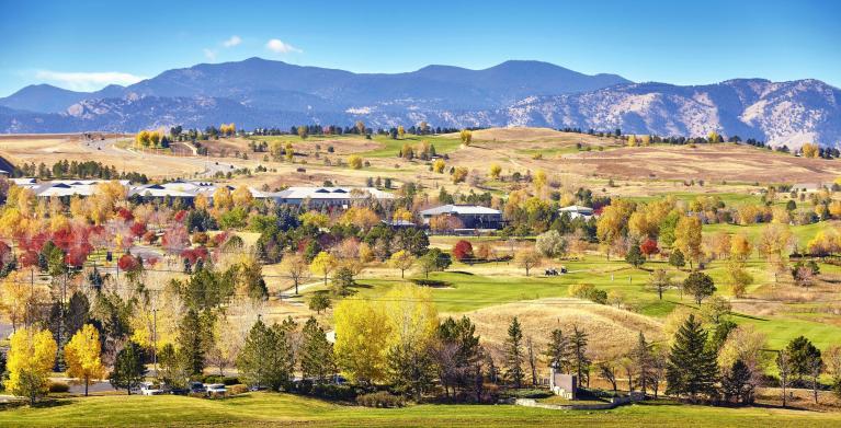 Small town with mountains in the background