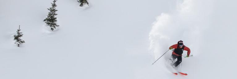 person skiing down a mountain