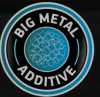 blue circle with big metal additive written