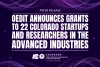 Press release banner announcing grants from OEDIT to 22 Colorado startups and researchers in the advanced industries, set against a purple background with swirling patterns.