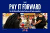 Adults and children engage in educational activities in a early childhood classroom, with a banner overhead reading "Pay It Forward - How the Colorado Startup Loan Fund cares for local communities